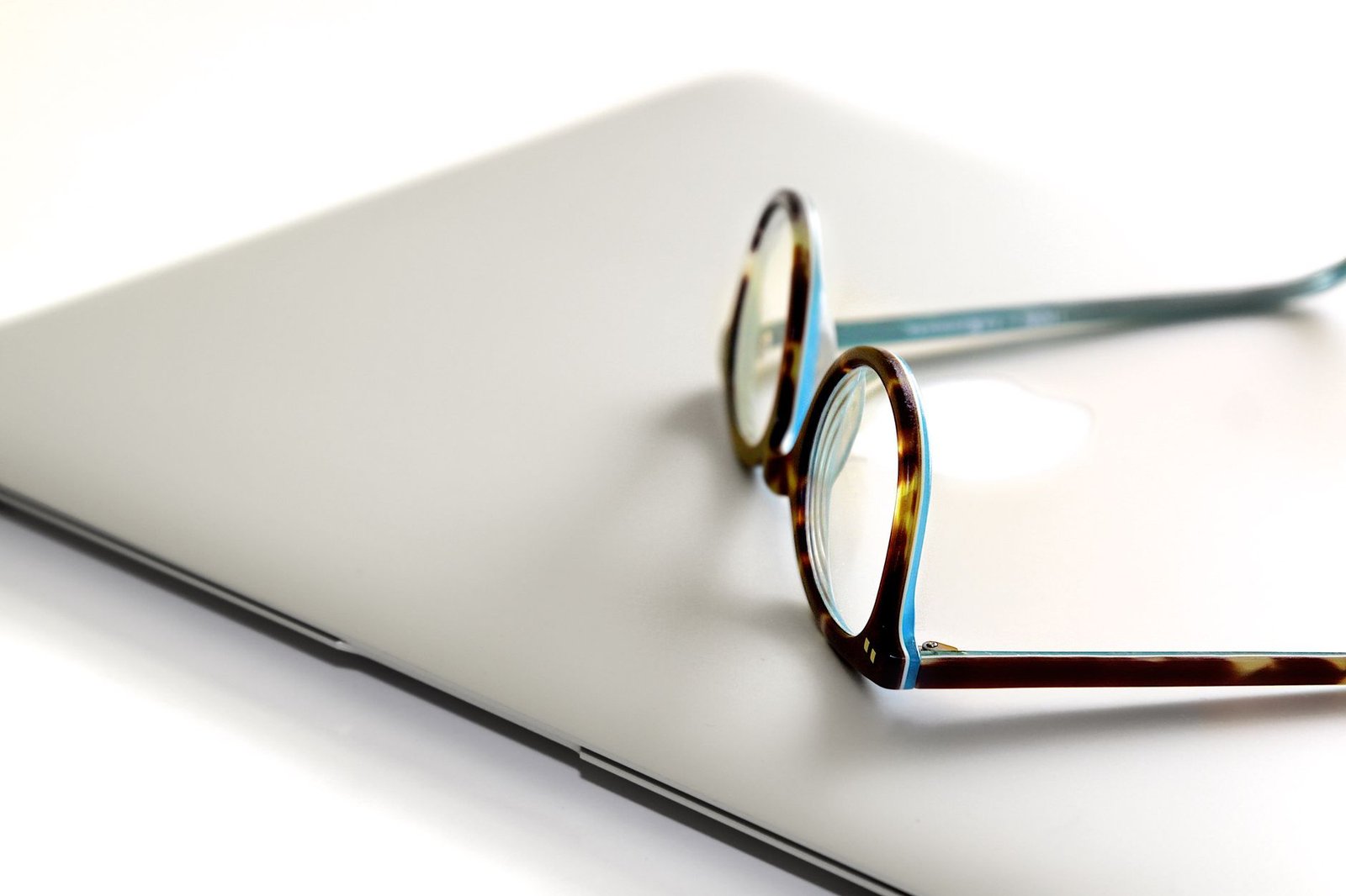 Person wearing modern rectangular Specscart glasses indoors
