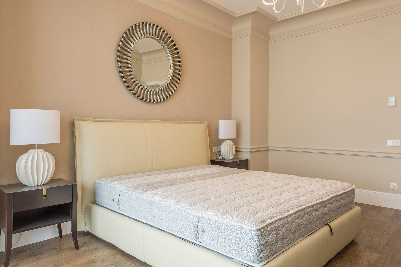 Emma Hybrid mattress in a bright minimalist bedroom setting