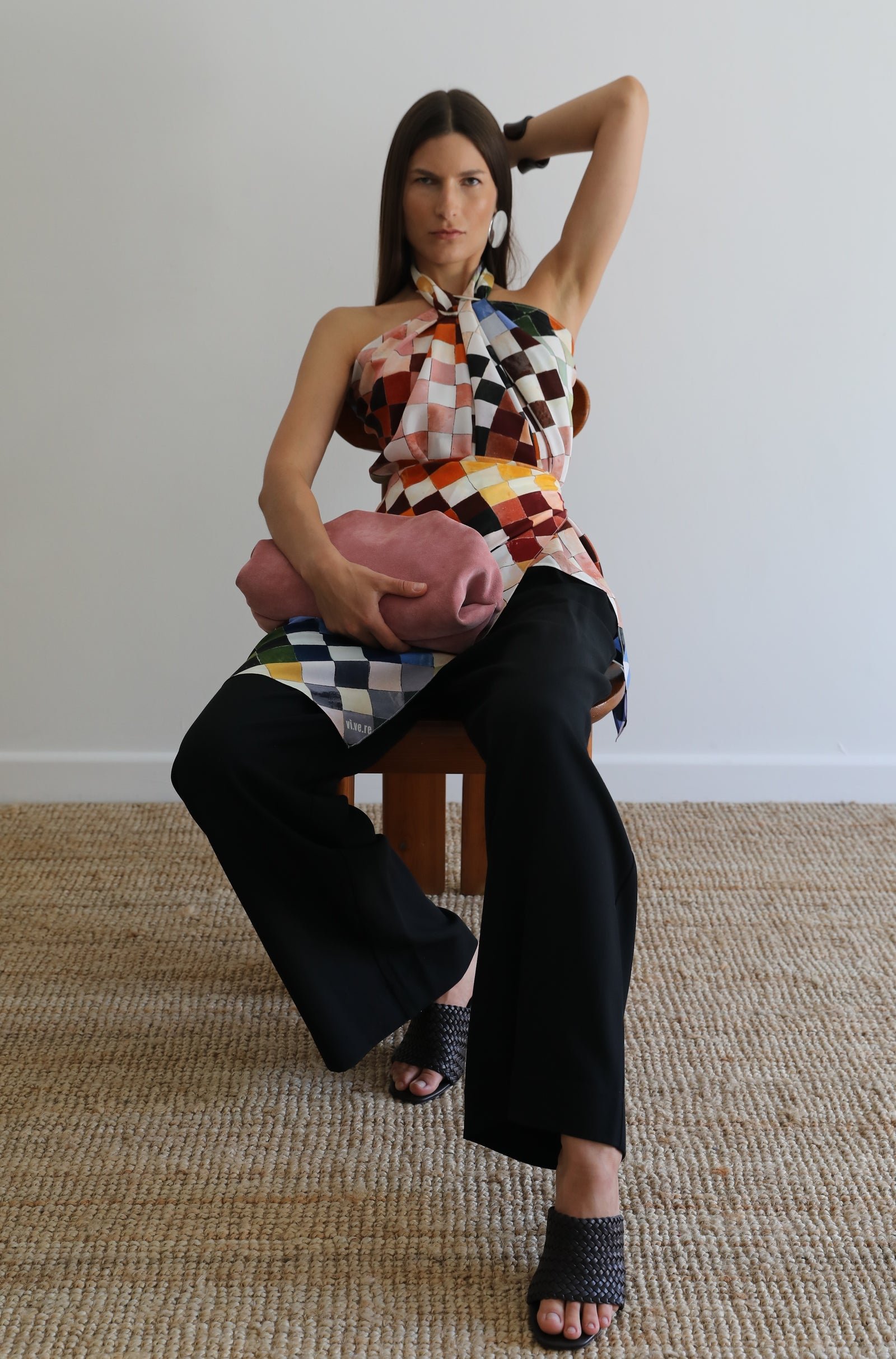 Modern VI.VE.RE wardrobe pieces presented in an editorial setting